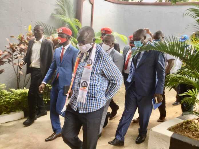 Besigye and Bobi Wine arrive for the United Forces of Change unveiling of No Nedda coalition campaign in Wakiso on June 15, 2020.