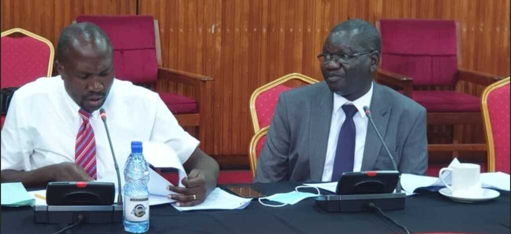 FDC President Patrick Amuriat and Secretary General Nandala Mafabi appearing before the Legal and Parliamentary Affairs Committee where they proposed a transitional government from Museveni.