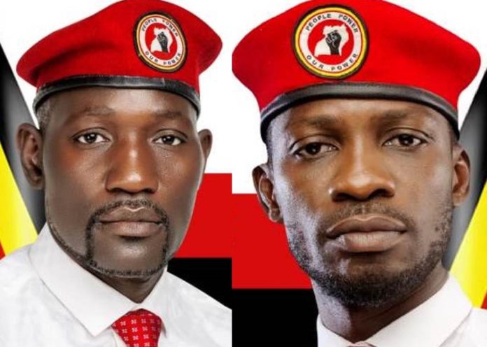 Eddie Yawe and his brother Bobi Wine donning red berets.