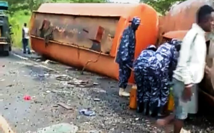 Police officers caught on camera siphoning fuel arrested