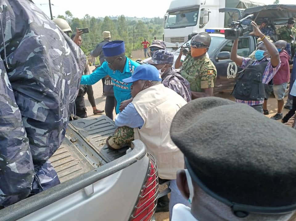 Amuriat helps in the evacuation of injured UPDF officer.