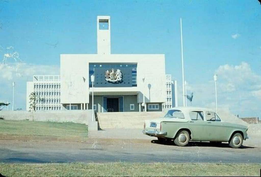 Uganda's Parliament building decades ago.  Parliament of Uganda building. 100 Years of Parliament: Here’s a look at the history of Uganda’s Parliament up to 1962 