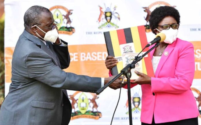 Uneb executive secretary Dan Odongo and chairperson Prof Mary Okwakol release UACE 2020 results. LIST: Uganda's Top 170 Schools in 2020 UACE Results Revealed